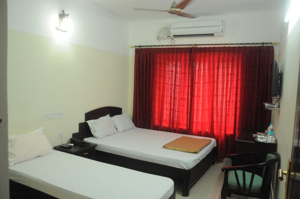Dreamz Hotel Thiruvananthapuram Номер фото